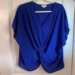 Umgee. Royal blue blouse. V-neck. Wide arm short sleeves.